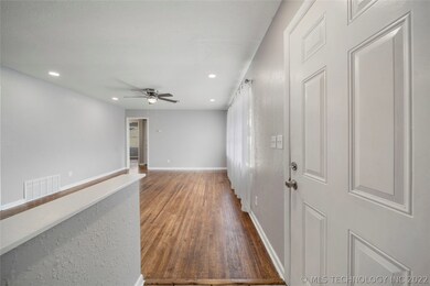 View from entry. New can lights, ceiling fans, etc