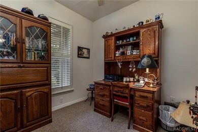 Office to the left inside the front entrance.