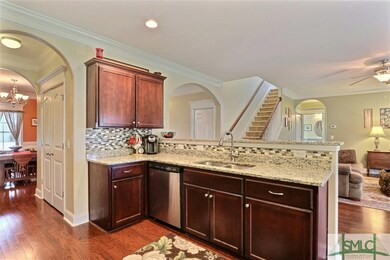 Breakfast bar for additional seating and Kitchen i