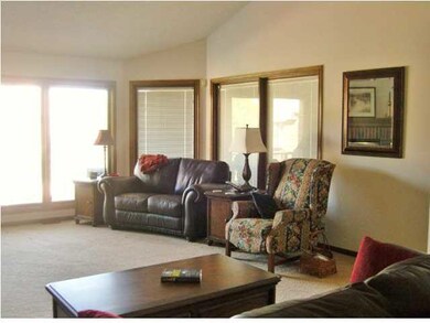 Wall of Pella Windows with Slim Shades between the