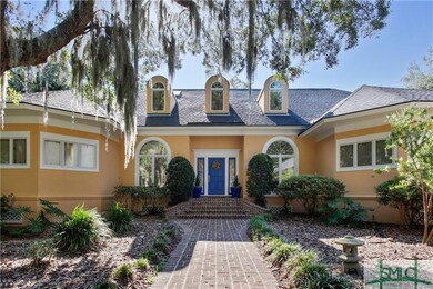 BRICK PAVERED WALKWAY TO THIS PHENOMENAL HOME WITH