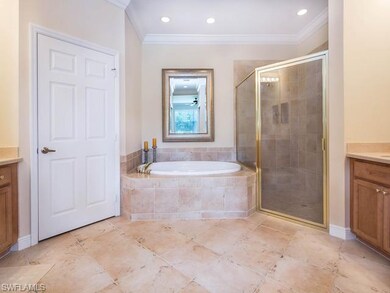 Master bath with separate tub and shower.  It also