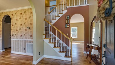 Open two story foyer with plenty of natural light throughout the year. 