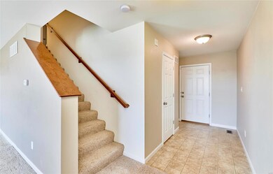 Formal entry foyer with hall closet and powder bat