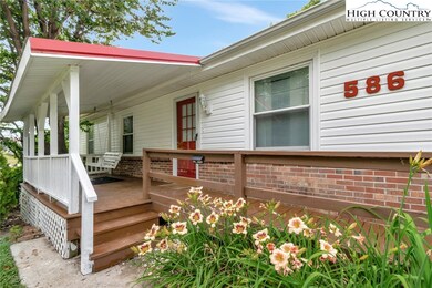 Covered front porch with swing