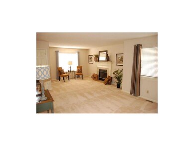 Living Room flows into the Dining Room area comple
