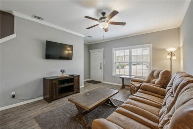 Living room with hardwood / wood-style flooring, c
