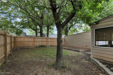 View of fenced backyard