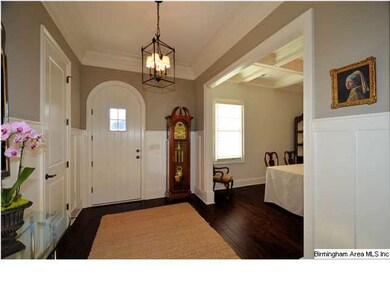 Foyer will welcome guests with formal dining room 