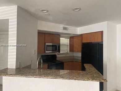 12950 Vista Isles Dr unit 411, Plantation, FL 33325 - photo 3