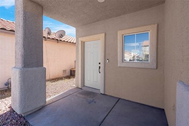 View of exterior entry featuring central AC, a pat