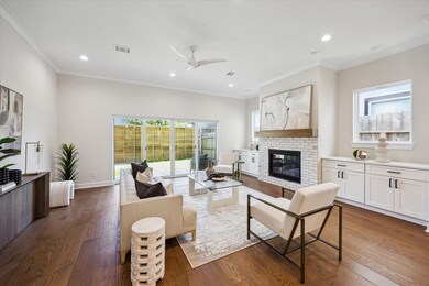 Expansive living area with fireplace and elegant b