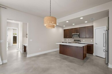 Kitchen featuring a sink, stainless steel applian