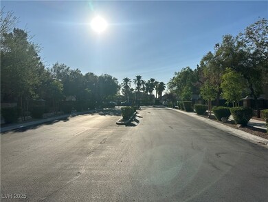 View of asphalt street with curbs