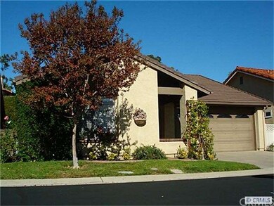 Attached 2 Car Garage with Built-in Storage Cabine