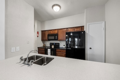 Kitchen open to living area