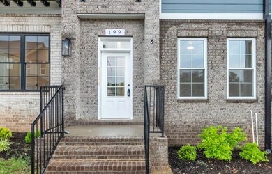 This adorable front porch is ready for your seasonal plants and decor!