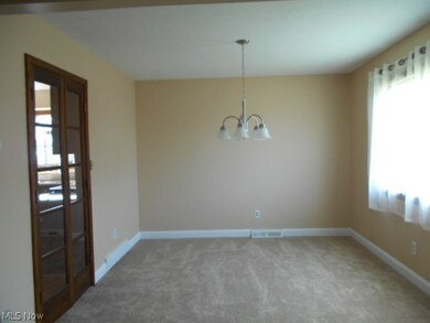 formal dining room for your holidays or candle light dinners.. yes this home has newer carpeting thru out..