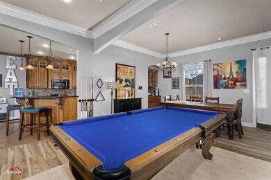 Family room featuring light wood-type flooring, an