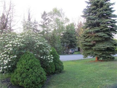 Exterior Front PRETTY LANDSCAPING IN FRONT YARD