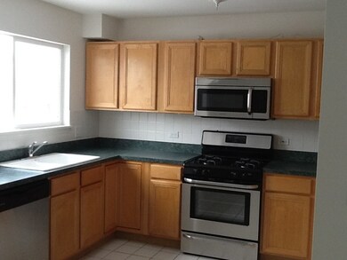 Maple cabinets, new stainless appliances