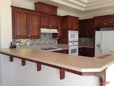Open kitchen with eating area to great room