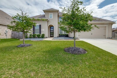 This custom home is situated on a sprawling 12k+ sq ft lot.