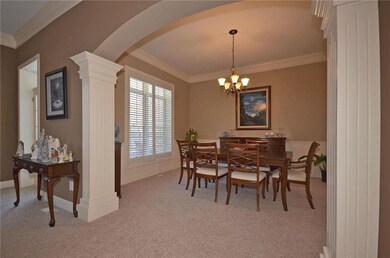 Arched entryways and heavy crown moldings
