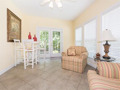 Large Sunroom with Tile Floors and ceiling fan!  W