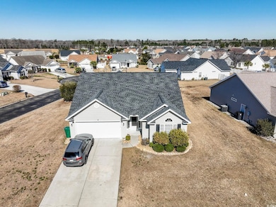 Birds eye view of property with a residential view
