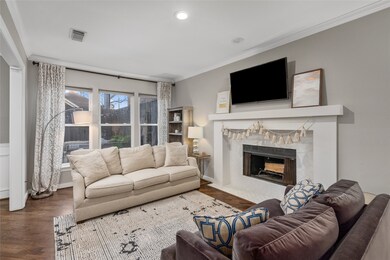 LIVING ROOM - Light pours into this space via over