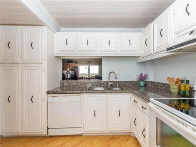 Pass-through from kitchen offers great views not c