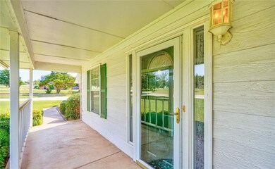Front Porch. Glass Storm Door. View looking toward