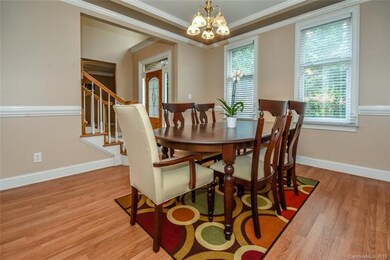 To your left, you will find the spacious dining ro