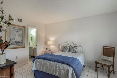 mail bedroom with en suite    bed, chair, small ta