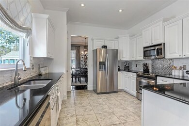 View of Kitchen from the living room sows large ki