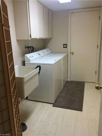Large bright laundry/utility area conveniently loc