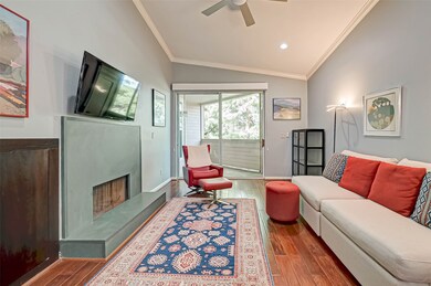 The living area is light and bright with access to the large balcony.