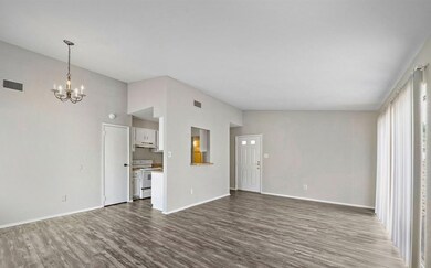 View of living area and kitchen area with updated