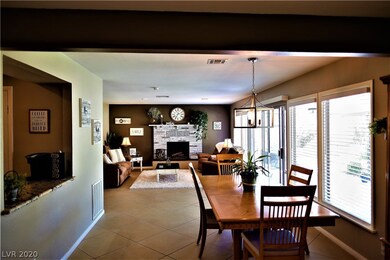 DINING AREA/BUTLER BAR/LIVING ROOM