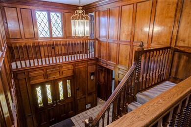 The Foyer Is Adorned With Judges Panelling And A C