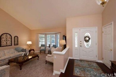 Living Room with bay window, foyer/entry brand new
