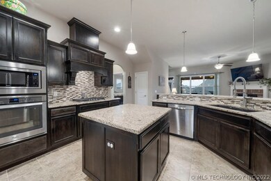Fully equipped island kitchen with Stainless steel