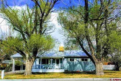 Home has Vinyl Siding and Metal Roof