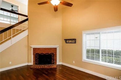 Living room with wood burning fireplace