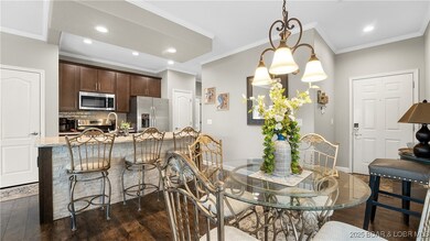 Stainless Steel Appliances with a Stone front Isla