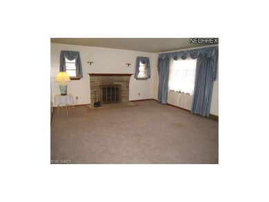 Large living room with fireplace.