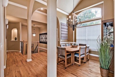 Beautiful staircase from main floor to basement floor area. Sweet, lit, art alcoves. Custom blinds throughout.