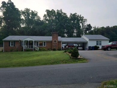 Full front view-plenty of parking. Large corner lo