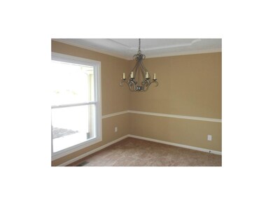 Formal Dining Room w/ large new window.